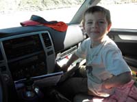 147-Kenny_played_in_vehicle_until_Peppe_returned_so_Daddy_can_go_poop-bad-then_drive_home