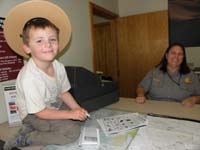 148-Kenny_wearing_Ranger's_hat_to_get_his_Junior_Ranger_Badge