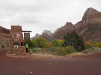 01-family_in_front_of_entrance_sign_for_Zion_National_Park