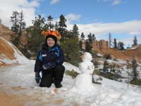 29-Kenny_gave_up-destroyed_his_snowman-then_wanted_a_picture_next_to_one_built_by_someone_else