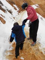 39-Mommy_helps_Kenny_through_the_muddiest_section