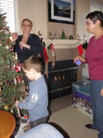10-Kenny_helps_Baba_and_Mommy_decorate_the_tree