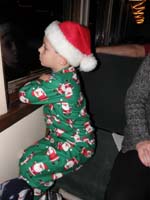 17-Kenny_watches_out_the_window_looking_for_the_North_Pole