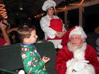 32-Kenny_meets_Santa_and_receives_a_bell_from_Santa's_sleigh