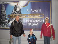 47-Poppy_Kenny_and_Baba_with_Polar_Express_sign