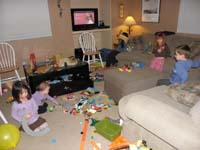 69-kids_playing_in_the_living_room-three_rooms_were_a_big_mess-sigh!!