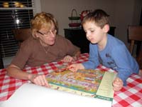 08-Kenny_reading_a_new_book_with_Grammy-more_like_a_game