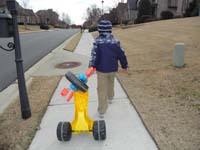 16-he_rode_it_a_long_way_down_the_street_then_had_an_attitude_about_having_to_carry_it_back_uphill