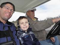 18-Daddy_Kenny_and_Grandpa_Duke_enjoy_the_golf_cart_ride_through_the_neighborhood