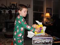 37-Kenny_opens_his_presents
