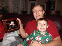 41-Kenny_and_Grandpa_Duke_showing_of_his_present-funny_face_Kenny