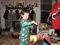 42-Kenny_opens_his_presents