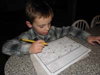 05-Kenny_doing_some_sample_kindergartner_homework