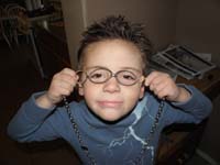 17-Kenny_being_goofy_with_Mommy's_jewelry