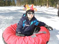 24-Kenny_in_the_sled_ready_for_Daddy_to_pull_him_uphill