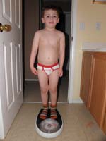64-time_to_measure_Kenny's_weight-he_was_tired_and_wouldn't_cooperate
