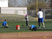 03-hitting_practice-Kenny_watching_the_ball_being_pitched_to_him