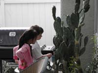 41-Kenny_shows_Tara_the_'ow-we'_cactus-only_touch_the_green_part