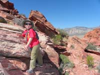 13-Kenny_is_approaching_the_top-White_Rock_Hills_Peak_in_distance