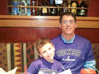 23-Kenny_and_Daddy_wearing_Bubba_Ball_Rockies_little_league_shirts_at_Red_Robin