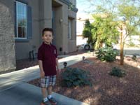 43-Kenny_in_front_yard_wearing_new_Challenger_shirt