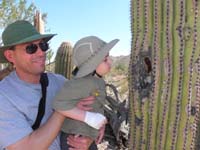 011-Daddy_showing_Kenny_a_cactus_hotel_hole
