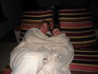 067-after_being_bandaged_up_by_Mommy,they_curl_up_together_in_blanket_outside_room