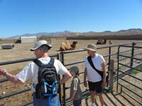 10-Poppy_Kenny_and_Baba_checking_out_the_camels_and_zebra