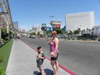 16-being_tourists_on_The_Strip-Kenny_and_Mommy_with_New_York_New_York,Excalibur,MGM_Grand,Tropicana_in_distance