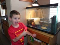 04-Kenny_gives_a_thumbs_up_to_his_first_pet_Rocky