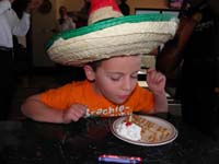 14-blowing_out_his_first_of_many_birthday_celebrations