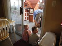 18-Kenny_and_Kammy_very_anxious_to_play_in_the_playhouse-waiting_for_Daddy_and_Poppy_to_clean_up