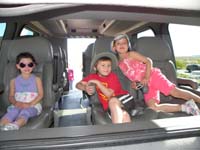04-Brooke_Kenny_and_Leyna_sit_in_a_Pink_Jeep_while_visiting_Red_Rock