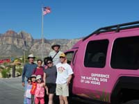 05-family_in_front_of_a_Pink_Jeep_at_Red_Rock