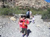 12-Kenny_enjoying_Daddy_snack_along_the_trail-he_actually_ate_all_of_it_instead_of_just_the_chocolate_chips