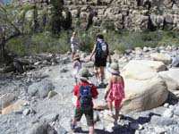 13-Jeff_Brooke_Cristy_Kenny_and_Leyna_walk_through_the_wash