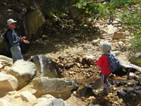 22-Kenny_and_Poppy_feeling_the_waterfall