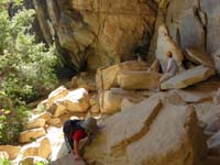 23-Kenny_and_Leyna_climbing_rocks_while_Jeff_relaxes