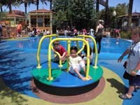 40-Kenny_having_fun_on_the_merry-go-round_at_Towne_Square_Mall