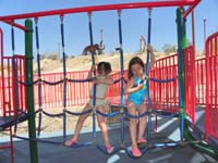 61-Brooke_and_Leyna_climbing_the_spiderweb