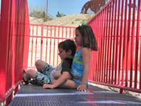 65-Leyna_saves_Kenny_as_he_pretends_to_slide_down