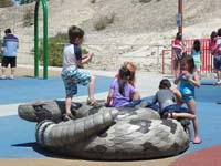 68-Kenny_Sarah_Ainsley_Ethan_Leyna_playing_on_a_stone_rattlesnake