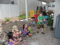 77-everyone_playing_in_the_backyard-Kenny_getting_ready_for_his_show