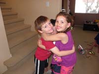 84-Kenny_Brooke_and_Leyna_hug_goodbye-Brooke_and_Leyna_going_back_home_to_Minnesota
