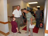 30-Kenny_tells_Poppy_and_Baba_all_about_the_program