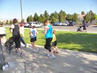 06-Mommy_and_Kenny_enjoy_the_race-Kenny_giggled_often_looking_back_at_Mommy