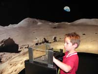 23-Kenny_gets_to_touch_a_metorite_from_the_moom-possible_future_astronaut