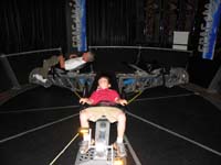 25-Kenny_and_Poppy_relax_in_the_gravity_chairs_as_it_spins