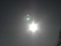 02-look_at_the_display_at_an_angle_(not_directly)_and_photograph_the_sun_and_it's_reflection_off_the_lens