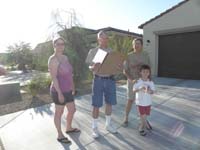 03-Mommy_Poppy_Baba_and_Kenny-Poppy_trying_to_figure_out_how_to_view_through_a_hole_in_paper